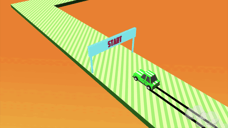 Green car crossing the start line on a striped Drift Boss track