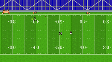 Retro Bowl receiver running with the football after making a catch